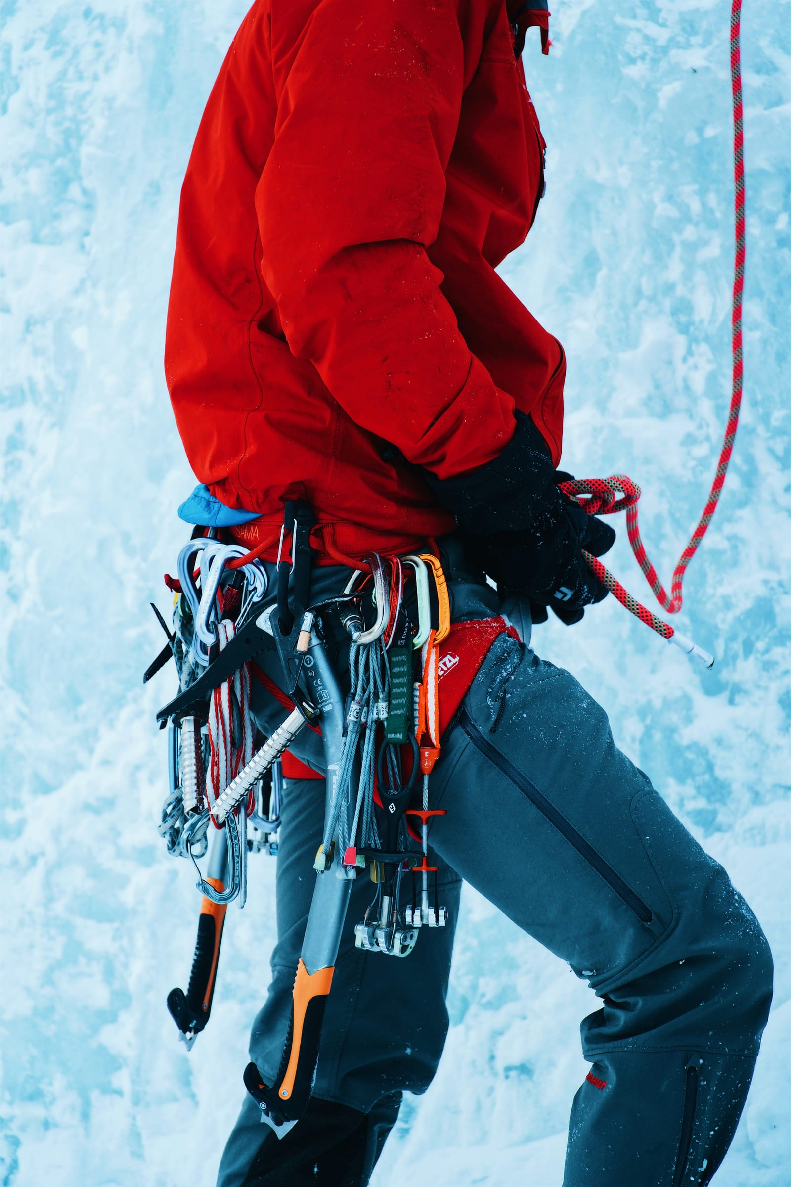 Carabiner Clip System attaching a bottle to a pack strap